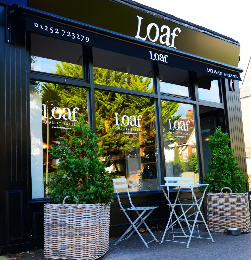Black branded awning for Loaf bakery in Farnham