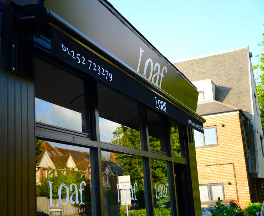 A close up image of the black awning at Loaf Bakery
