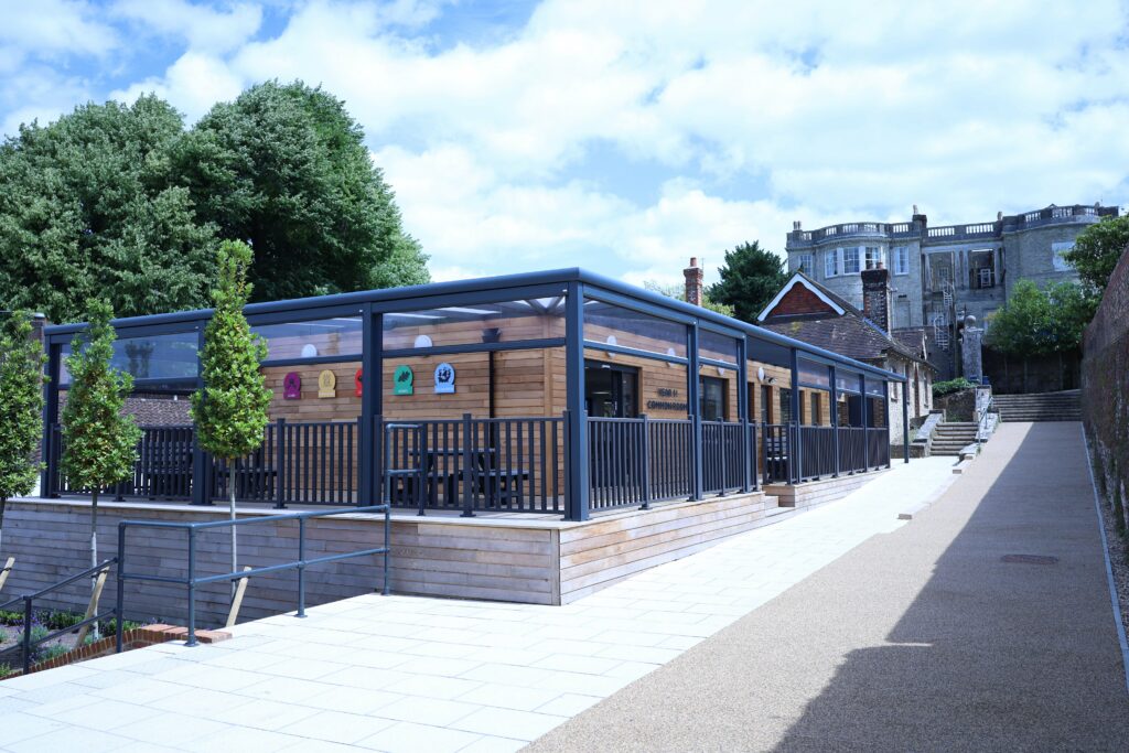 Our L-shaped Lean-to canopy shading the Sixth Form decking area at Seaford College.